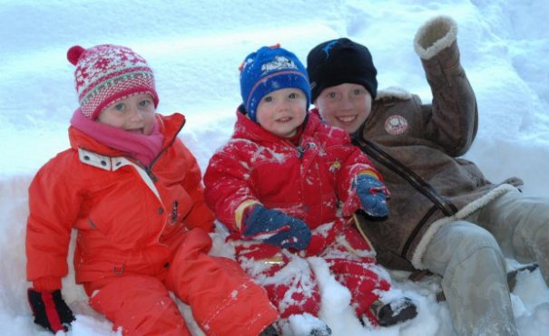 Happy kids in the snow