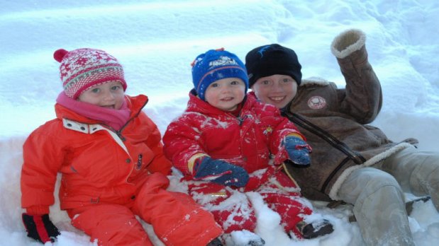 Happy kids in the snow